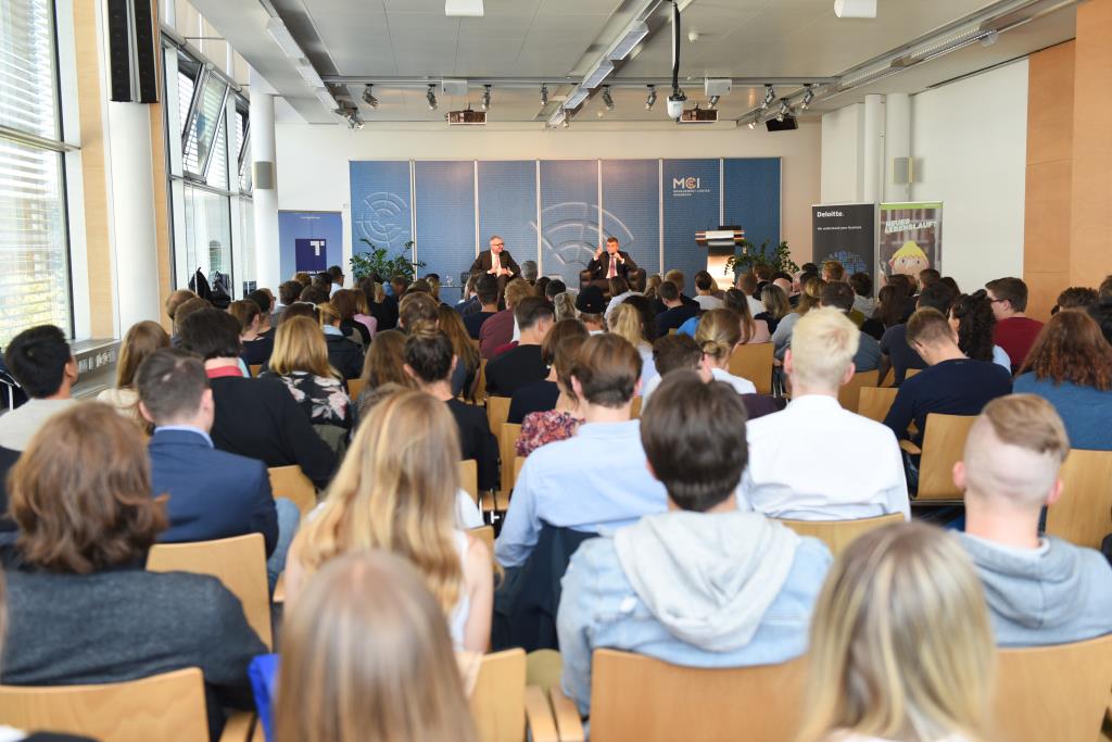 The hall full with guests. 