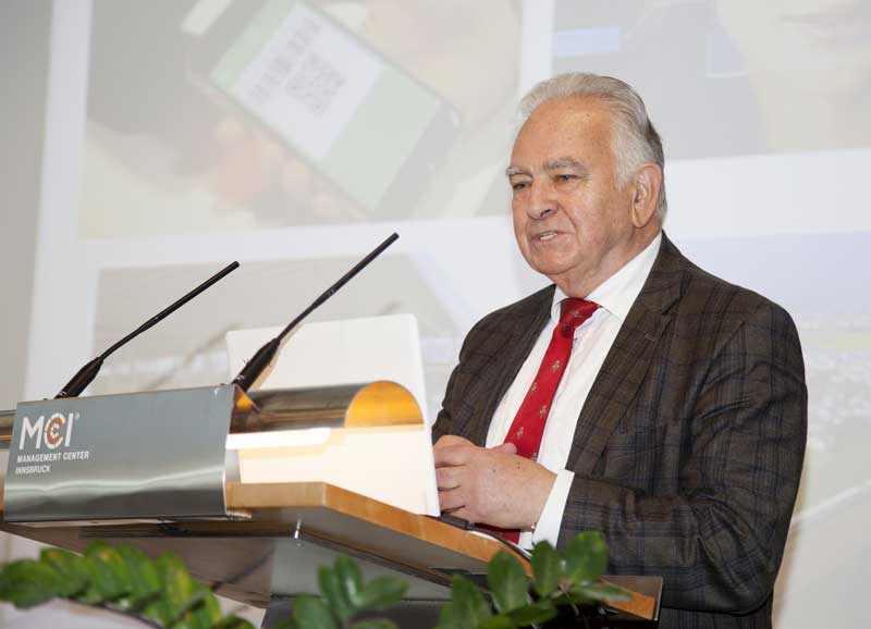 Speaker behind the lectern