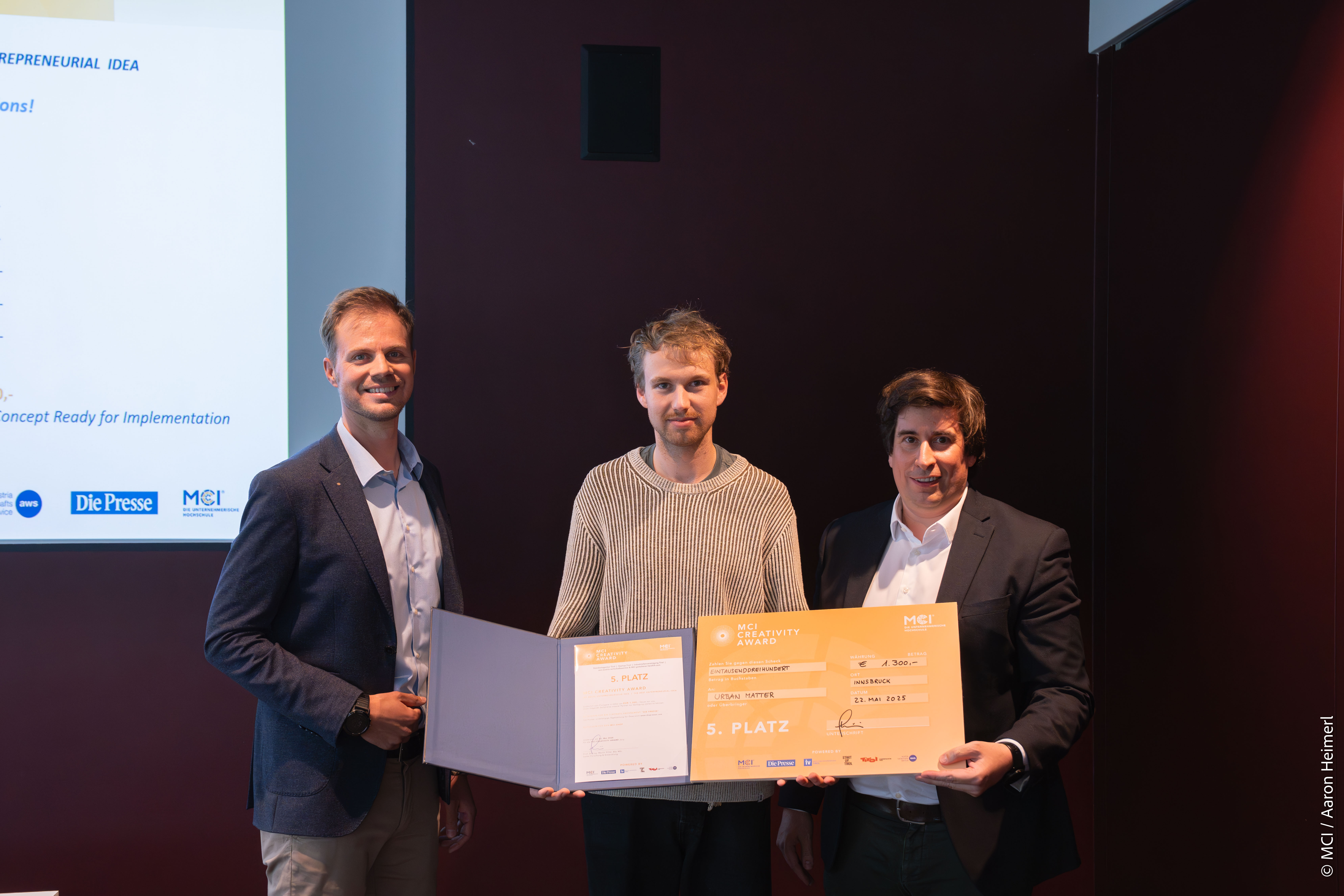 5th place for “Urban Matter”; from left to right: Benjamin Suitner (MCI), award winner Stefan Rausch and Martin Pillei (MCI) ©MCI/Aaron Heimerl