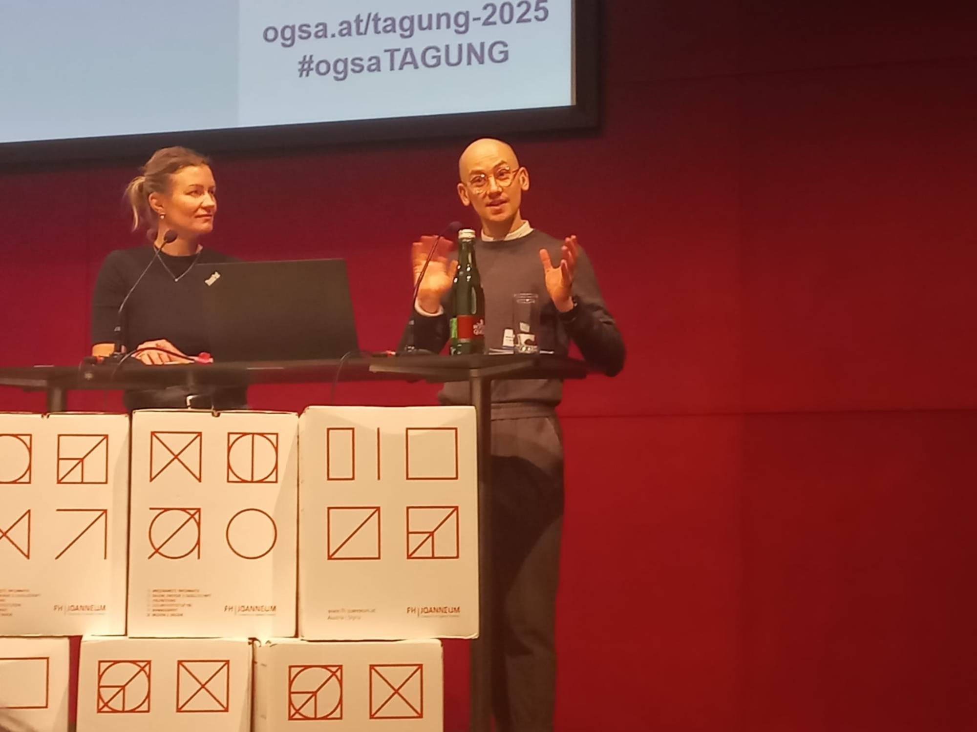 <p>Impressions from the 7th ogsaCONFERENCE in Graz | Book presentation with Moritz Reisberger (right) © MCI/Lienhart</p>