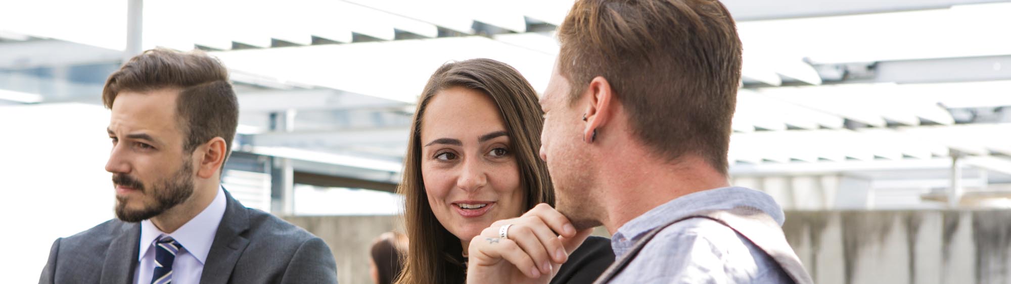 Students discussing on the roof terrace